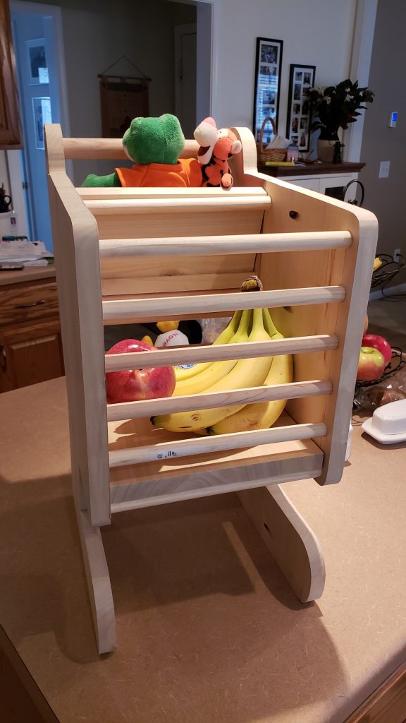 Child's wooden shopping cart