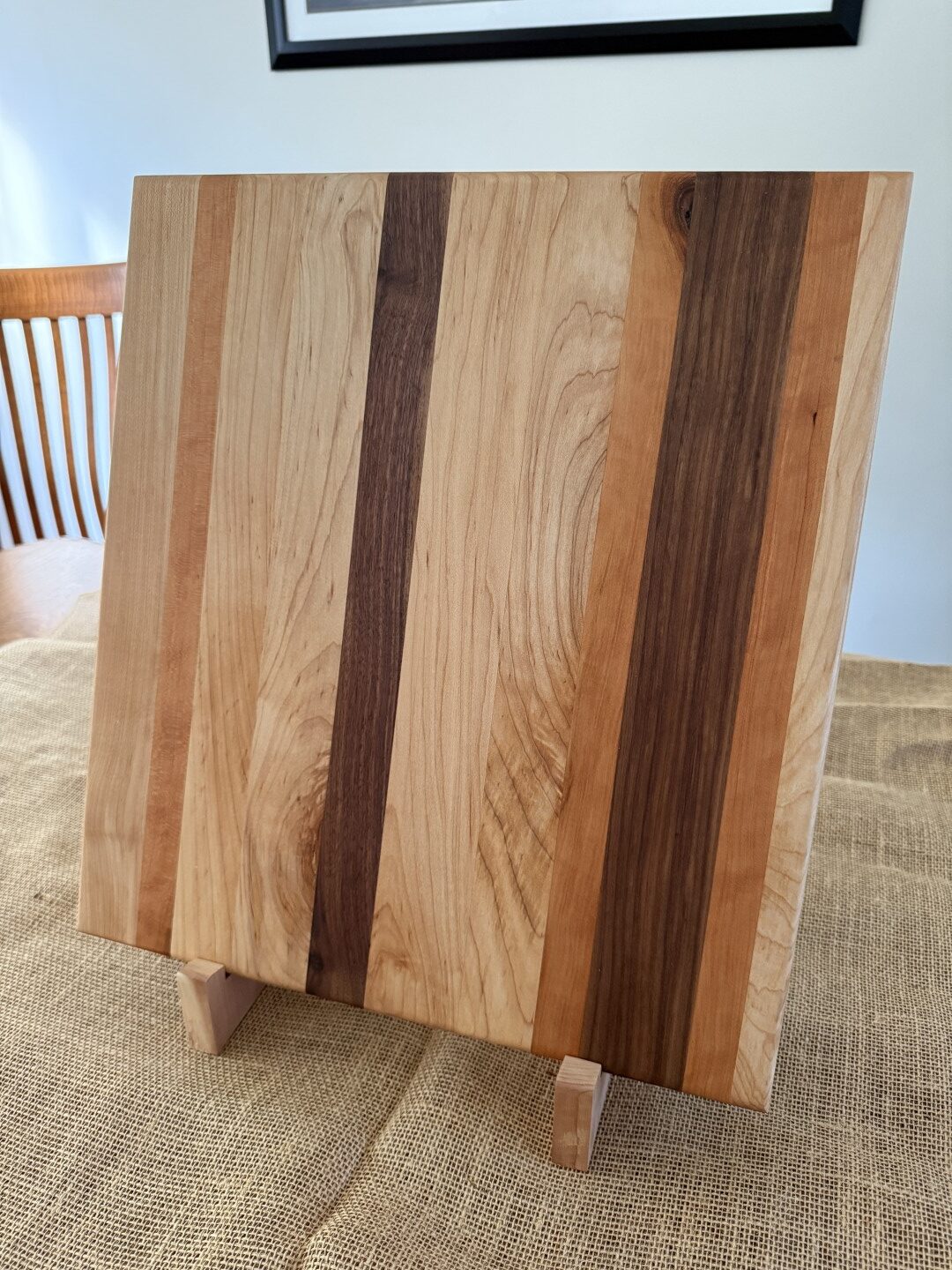 16” x 17” cutting board, made of black walnut, cherry, and maple, is ideal for smaller spaces. - Image 4